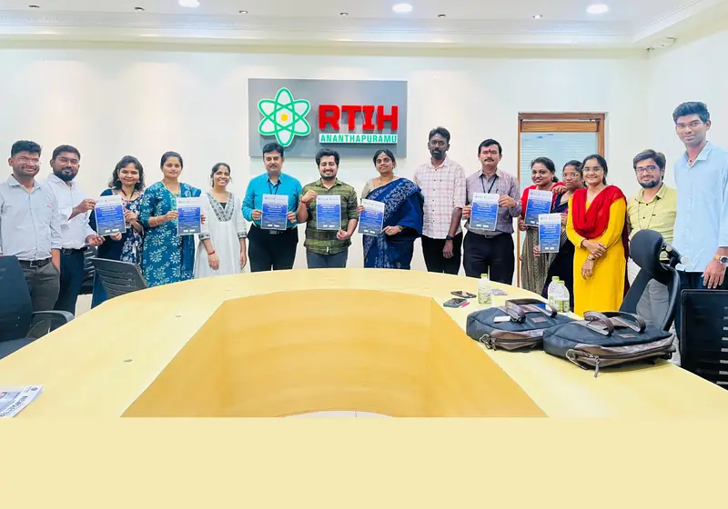 RTIH Anantapuramu team holding copies of the MoU with the Poditivity team